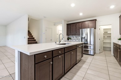 Beautifully upgraded home close to the lakes, yacht club & more on Estrella Mountain Ranch Golf Course in Arizona - for sale on GolfHomes.com, golf home, golf lot