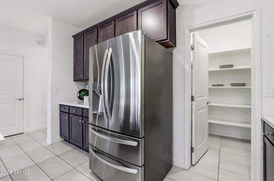 Beautifully upgraded home close to the lakes, yacht club & more on Estrella Mountain Ranch Golf Course in Arizona - for sale on GolfHomes.com, golf home, golf lot