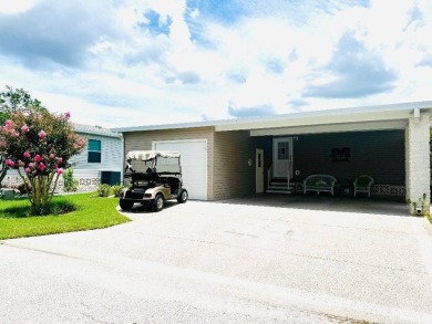 Immaculate Triple-Wide Beauty! Spacious 3 Bed / 2 Bath in on Schalamar Creek Golf and Country Club in Florida - for sale on GolfHomes.com, golf home, golf lot