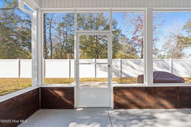 Welcome to your ideal coastal escape! This charming one-story on Sea Trail Golf Resort in North Carolina - for sale on GolfHomes.com, golf home, golf lot