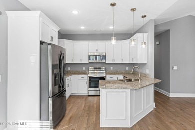 Welcome to your ideal coastal escape! This charming one-story on Sea Trail Golf Resort in North Carolina - for sale on GolfHomes.com, golf home, golf lot