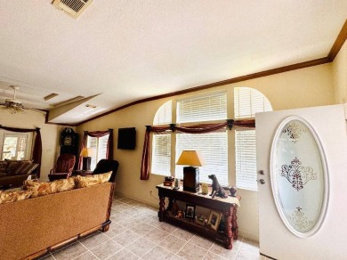 Immaculate Triple-Wide Beauty! Spacious 3 Bed / 2 Bath in on Schalamar Creek Golf and Country Club in Florida - for sale on GolfHomes.com, golf home, golf lot