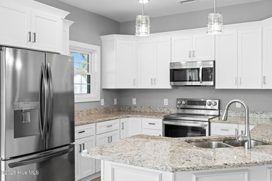 Welcome to your ideal coastal escape! This charming one-story on Sea Trail Golf Resort in North Carolina - for sale on GolfHomes.com, golf home, golf lot