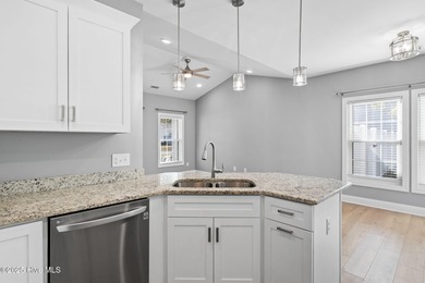 Welcome to your ideal coastal escape! This charming one-story on Sea Trail Golf Resort in North Carolina - for sale on GolfHomes.com, golf home, golf lot