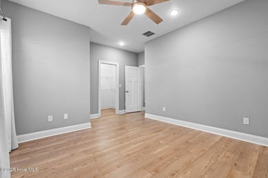 Welcome to your ideal coastal escape! This charming one-story on Sea Trail Golf Resort in North Carolina - for sale on GolfHomes.com, golf home, golf lot