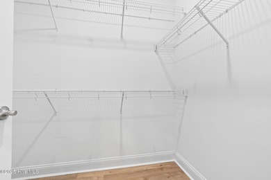 Welcome to your ideal coastal escape! This charming one-story on Sea Trail Golf Resort in North Carolina - for sale on GolfHomes.com, golf home, golf lot