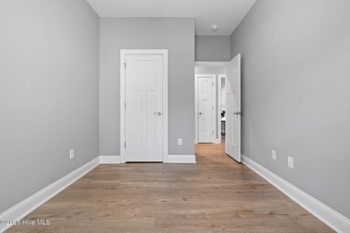 Welcome to your ideal coastal escape! This charming one-story on Sea Trail Golf Resort in North Carolina - for sale on GolfHomes.com, golf home, golf lot