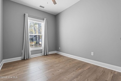 Welcome to your ideal coastal escape! This charming one-story on Sea Trail Golf Resort in North Carolina - for sale on GolfHomes.com, golf home, golf lot