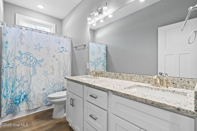 Welcome to your ideal coastal escape! This charming one-story on Sea Trail Golf Resort in North Carolina - for sale on GolfHomes.com, golf home, golf lot