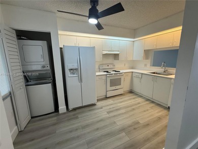 Bright & spacious updated condo 2 bedroom & 1.5 bath located in on Flamingo Lakes Country Club in Florida - for sale on GolfHomes.com, golf home, golf lot