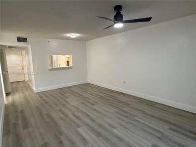 Bright & spacious updated condo 2 bedroom & 1.5 bath located in on Flamingo Lakes Country Club in Florida - for sale on GolfHomes.com, golf home, golf lot