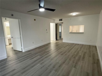 Bright & spacious updated condo 2 bedroom & 1.5 bath located in on Flamingo Lakes Country Club in Florida - for sale on GolfHomes.com, golf home, golf lot