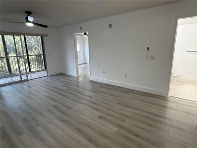 Bright & spacious updated condo 2 bedroom & 1.5 bath located in on Flamingo Lakes Country Club in Florida - for sale on GolfHomes.com, golf home, golf lot