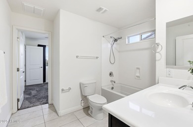 Beautifully upgraded home close to the lakes, yacht club & more on Estrella Mountain Ranch Golf Course in Arizona - for sale on GolfHomes.com, golf home, golf lot