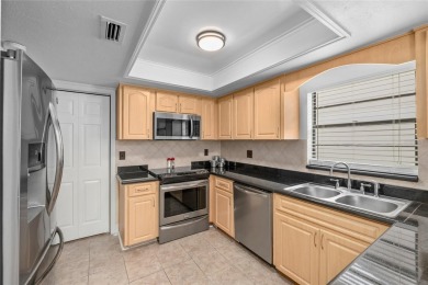 Price Improvement!  Fully updated!  Bring your golf clubs and on East Lake Woodlands Country Club in Florida - for sale on GolfHomes.com, golf home, golf lot