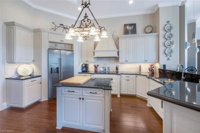 This timeless and elegant residence in Kensington Gardens with a on Kensington Golf and Country Club in Florida - for sale on GolfHomes.com, golf home, golf lot