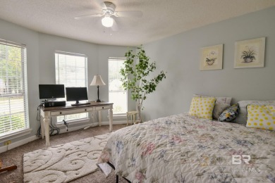 This charming single-story cottage features 3 bedrooms and 2 on Lake Forest Yacht and Country Club in Alabama - for sale on GolfHomes.com, golf home, golf lot