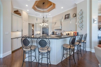 This timeless and elegant residence in Kensington Gardens with a on Kensington Golf and Country Club in Florida - for sale on GolfHomes.com, golf home, golf lot
