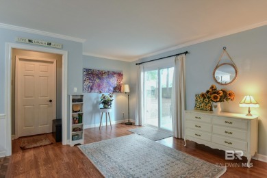 This charming single-story cottage features 3 bedrooms and 2 on Lake Forest Yacht and Country Club in Alabama - for sale on GolfHomes.com, golf home, golf lot