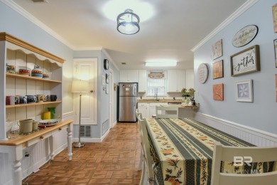 This charming single-story cottage features 3 bedrooms and 2 on Lake Forest Yacht and Country Club in Alabama - for sale on GolfHomes.com, golf home, golf lot