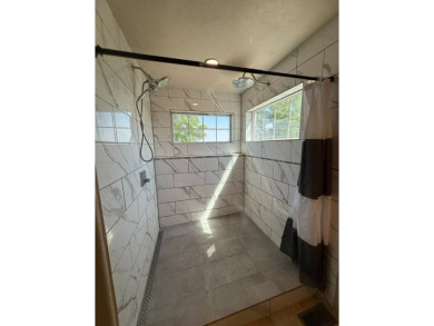 Welcome to this stunning 4-bedroom, 4-bathroom home nestled on Sidney Country Club in Montana - for sale on GolfHomes.com, golf home, golf lot