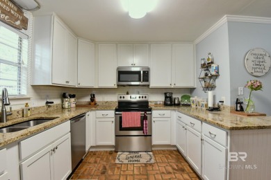 This charming single-story cottage features 3 bedrooms and 2 on Lake Forest Yacht and Country Club in Alabama - for sale on GolfHomes.com, golf home, golf lot