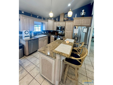 Your Coastal Retreat awaits! Waterfront 2bd/2ba move-in ready on Long Island Golf Course in Texas - for sale on GolfHomes.com, golf home, golf lot