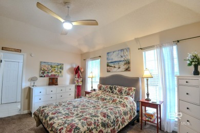 This charming single-story cottage features 3 bedrooms and 2 on Lake Forest Yacht and Country Club in Alabama - for sale on GolfHomes.com, golf home, golf lot