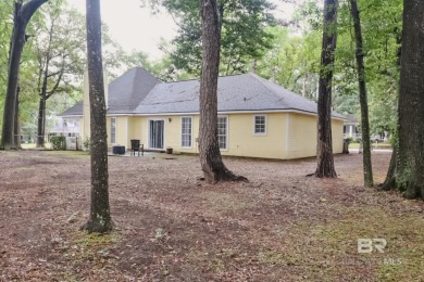 This charming single-story cottage features 3 bedrooms and 2 on Lake Forest Yacht and Country Club in Alabama - for sale on GolfHomes.com, golf home, golf lot