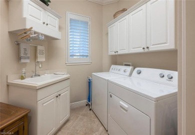 This timeless and elegant residence in Kensington Gardens with a on Kensington Golf and Country Club in Florida - for sale on GolfHomes.com, golf home, golf lot