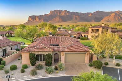 Experience luxurious living offered TURNKEY FURNISHED, (artwork on Superstition Mountain Club - Lost Gold in Arizona - for sale on GolfHomes.com, golf home, golf lot