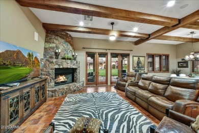 Experience luxurious living offered TURNKEY FURNISHED, (artwork on Superstition Mountain Club - Lost Gold in Arizona - for sale on GolfHomes.com, golf home, golf lot