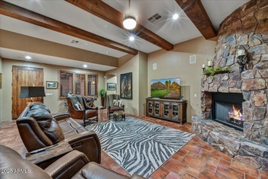 Experience luxurious living offered TURNKEY FURNISHED, (artwork on Superstition Mountain Club - Lost Gold in Arizona - for sale on GolfHomes.com, golf home, golf lot
