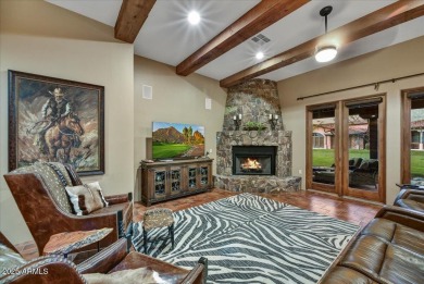 Experience luxurious living offered TURNKEY FURNISHED, (artwork on Superstition Mountain Club - Lost Gold in Arizona - for sale on GolfHomes.com, golf home, golf lot