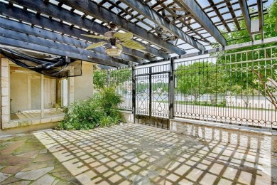 Absolutely stunning designer decorated townhome in gated on De Cordova Bend Country Club in Texas - for sale on GolfHomes.com, golf home, golf lot