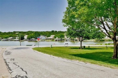Absolutely stunning designer decorated townhome in gated on De Cordova Bend Country Club in Texas - for sale on GolfHomes.com, golf home, golf lot