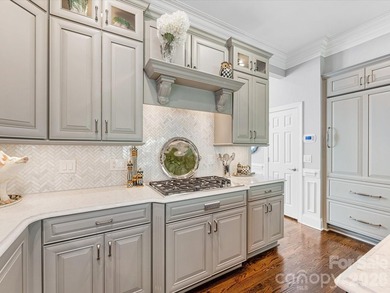 This beautiful home is a hidden gem in the gated community of on Carmel Country Club in North Carolina - for sale on GolfHomes.com, golf home, golf lot