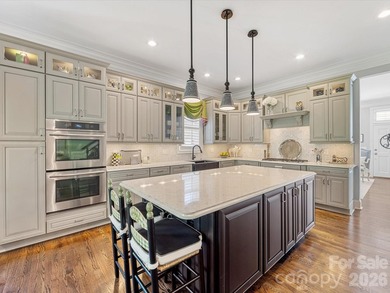 This beautiful home is a hidden gem in the gated community of on Carmel Country Club in North Carolina - for sale on GolfHomes.com, golf home, golf lot