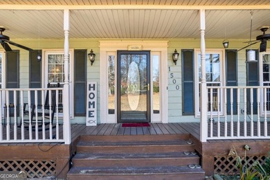 Welcome home to this beautiful contemporary home, spread out on on Canongate At Georgia National Golf Club in Georgia - for sale on GolfHomes.com, golf home, golf lot