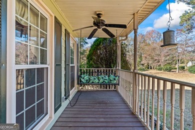 Welcome home to this beautiful contemporary home, spread out on on Canongate At Georgia National Golf Club in Georgia - for sale on GolfHomes.com, golf home, golf lot