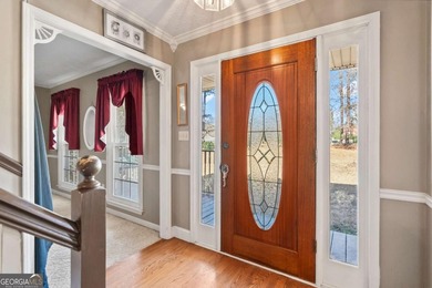 Welcome home to this beautiful contemporary home, spread out on on Canongate At Georgia National Golf Club in Georgia - for sale on GolfHomes.com, golf home, golf lot