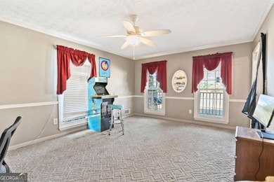 Welcome home to this beautiful contemporary home, spread out on on Canongate At Georgia National Golf Club in Georgia - for sale on GolfHomes.com, golf home, golf lot