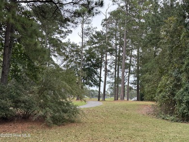 Build your dream home on this beautiful, large corner lot in on Brunswick Plantation and Golf Resorts in North Carolina - for sale on GolfHomes.com, golf home, golf lot