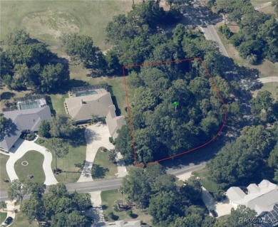 A RARE GEM! Beautiful golf course corner lot (.66 acres) located on Sugarmill Woods Golf and Country Club in Florida - for sale on GolfHomes.com, golf home, golf lot