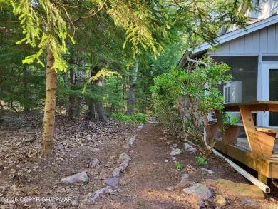Welcome to your dream retreat! This charming 3-bedroom on Split Rock Resort and Country Club in Pennsylvania - for sale on GolfHomes.com, golf home, golf lot