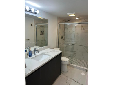 Enjoy resort-style living in Wynmoor's sought-after Antigua I on Wynmoor Golf Course in Florida - for sale on GolfHomes.com, golf home, golf lot