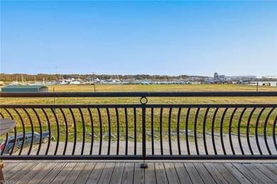 Experience premier coastal living in this elevator-accessible on Bay Creek Golf Club in Virginia - for sale on GolfHomes.com, golf home, golf lot