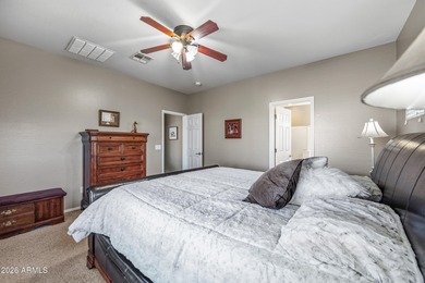 Welcome home to this spacious five-bedroom, three-bath home in on Poston Butte Golf Club in Arizona - for sale on GolfHomes.com, golf home, golf lot