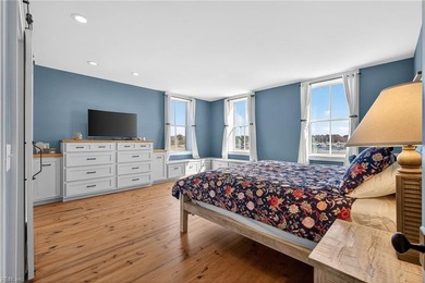 Experience premier coastal living in this elevator-accessible on Bay Creek Golf Club in Virginia - for sale on GolfHomes.com, golf home, golf lot