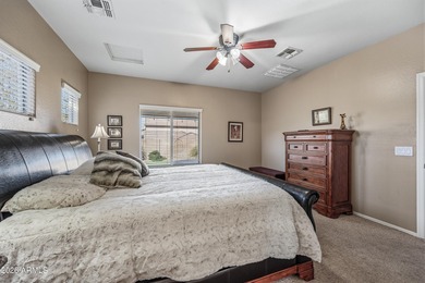 Welcome home to this spacious five-bedroom, three-bath home in on Poston Butte Golf Club in Arizona - for sale on GolfHomes.com, golf home, golf lot